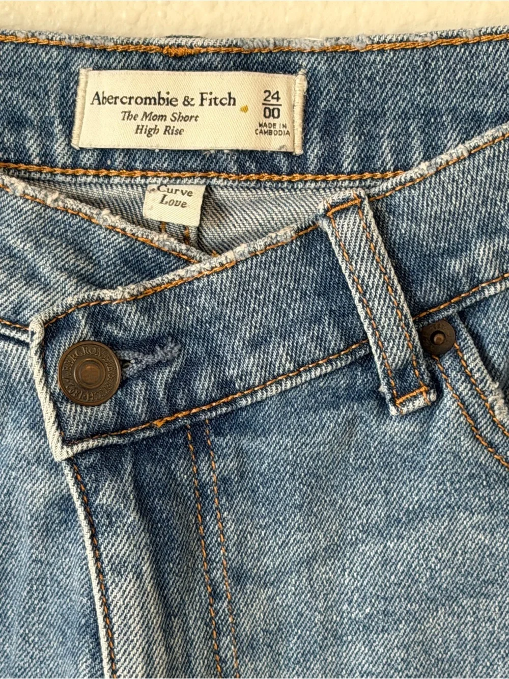 Abercrombie & Fitch Medium Criss Cross Blue High-Rise Frayed Hem Denim Shorts